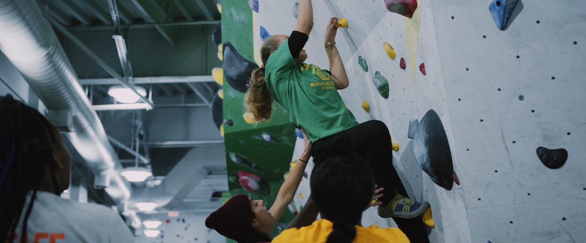 A Chicago Boys and Girls Club member tries climbing for the first time at First Ascent in Chicago.