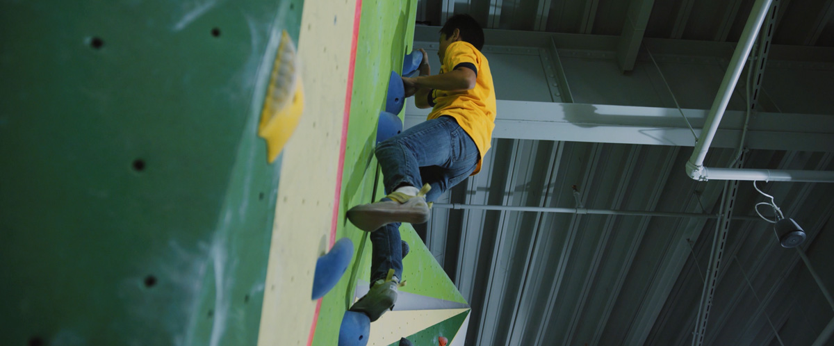 A Chicago Boys and Girls Club member tries climbing for the first time at First Ascent in Chicago.